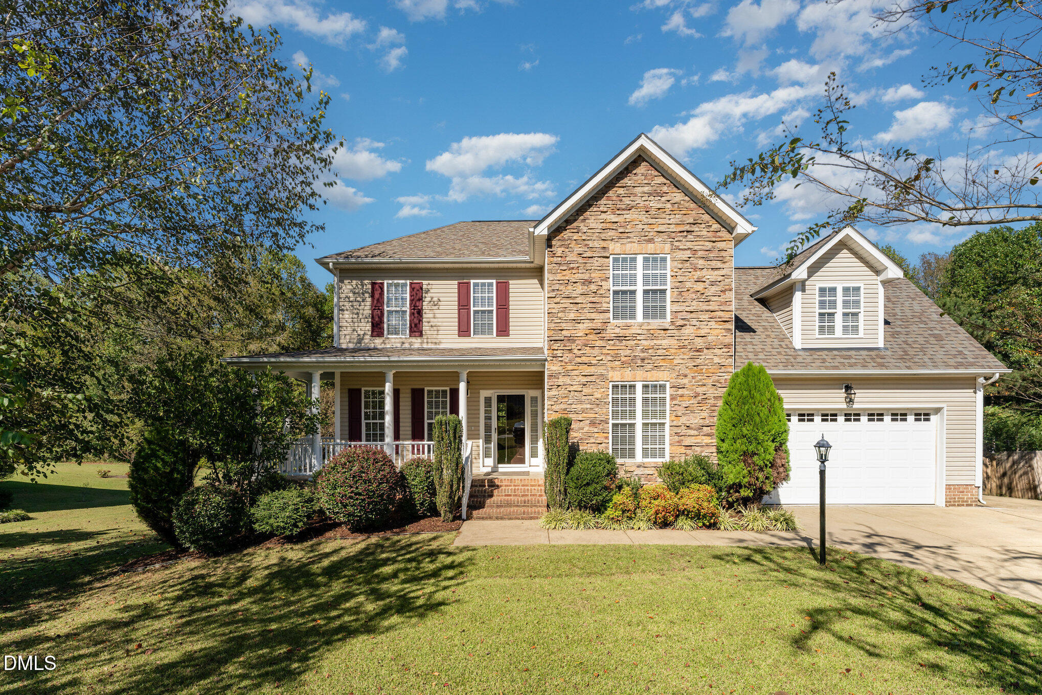 272 Travel Lite Drive Raleigh, NC 27603 - Photo 2 of 30 a view of a house with a yard and potted plants