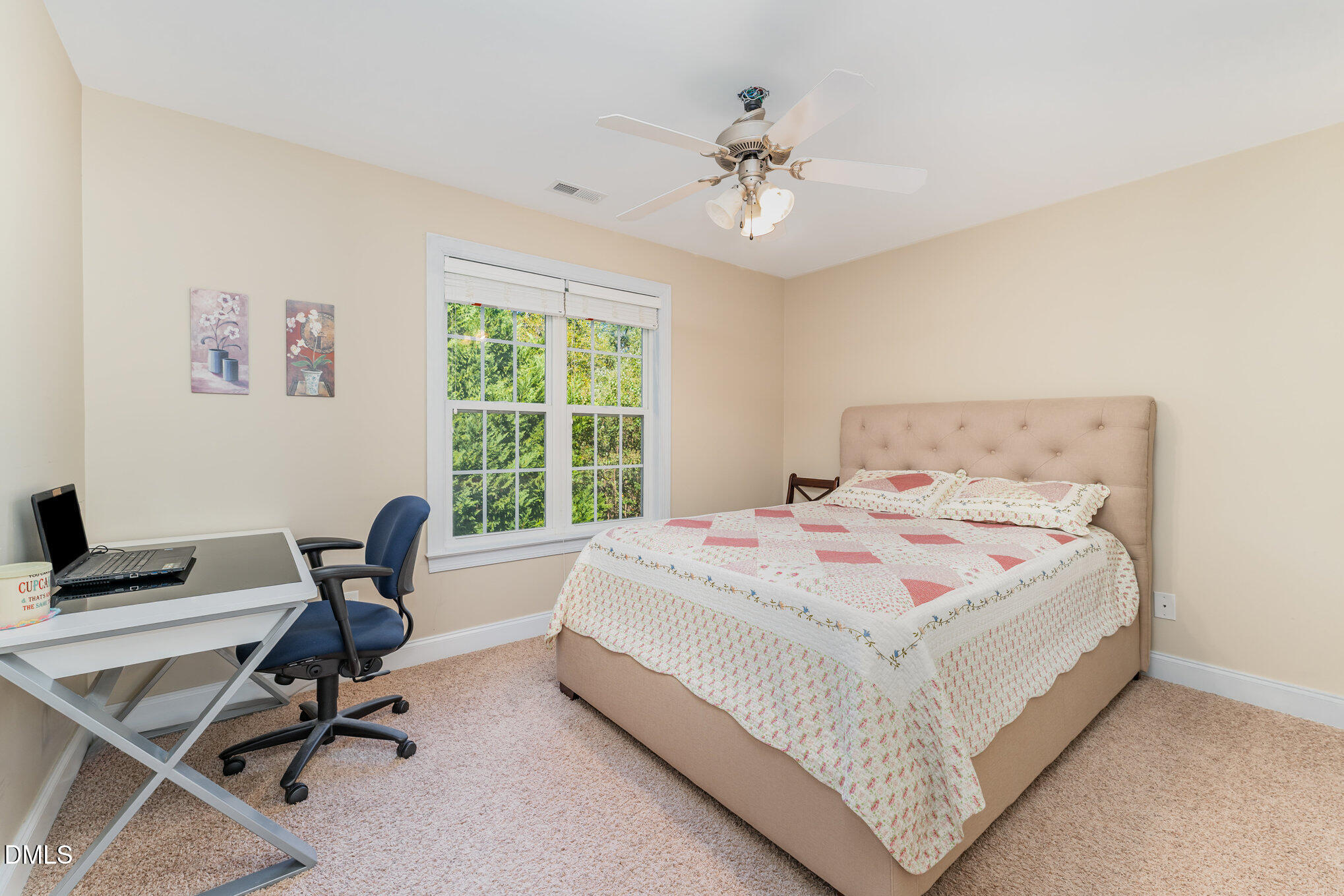 272 Travel Lite Drive Raleigh, NC 27603 - Photo 22 of 30 a bed room with a bed and a desk