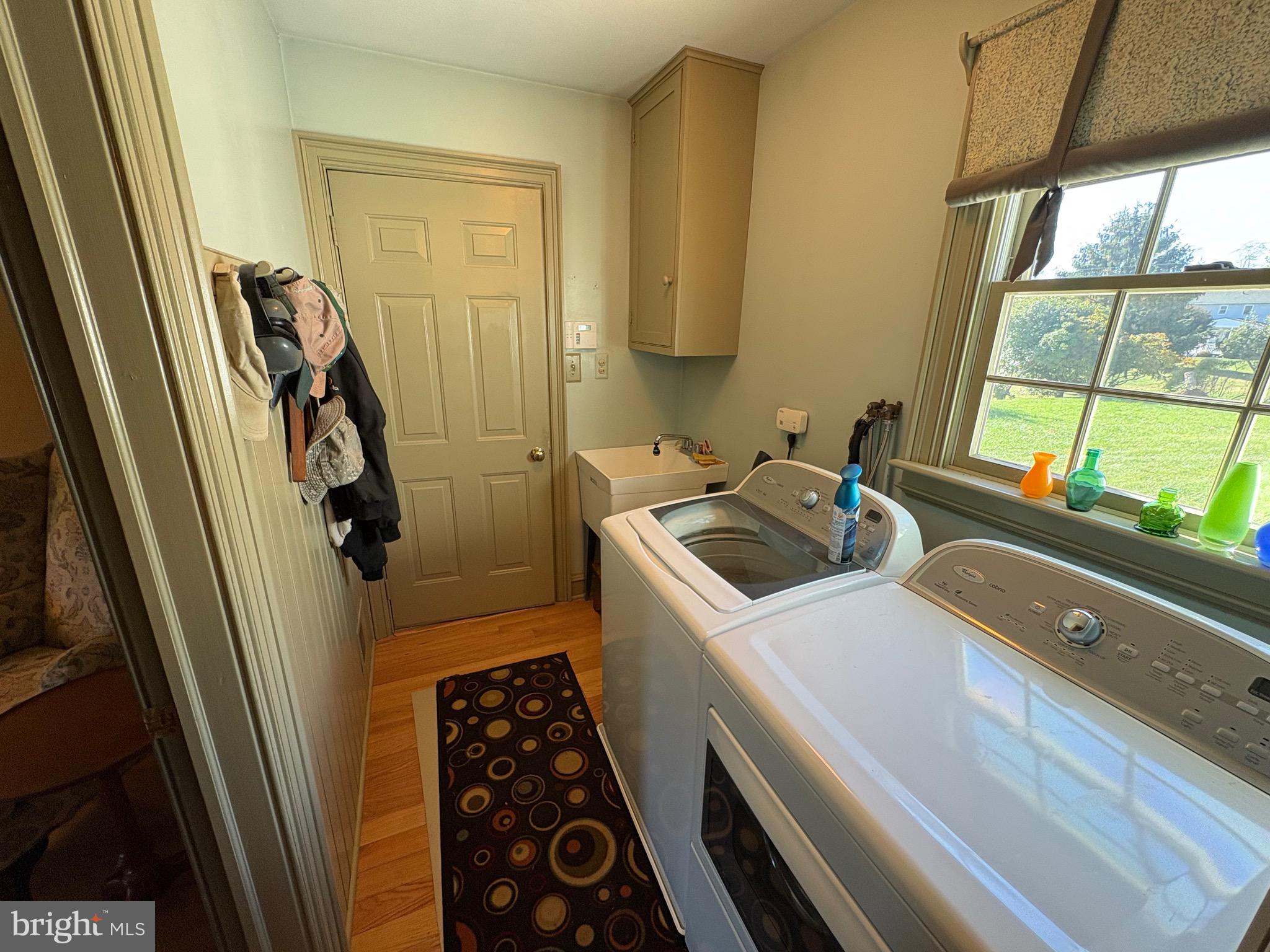 4503 Crosswicks Hamilton Square Road Robbinsville, NJ 08691 - Photo 11 of 44 a kitchen with a sink a refrigerator and a window