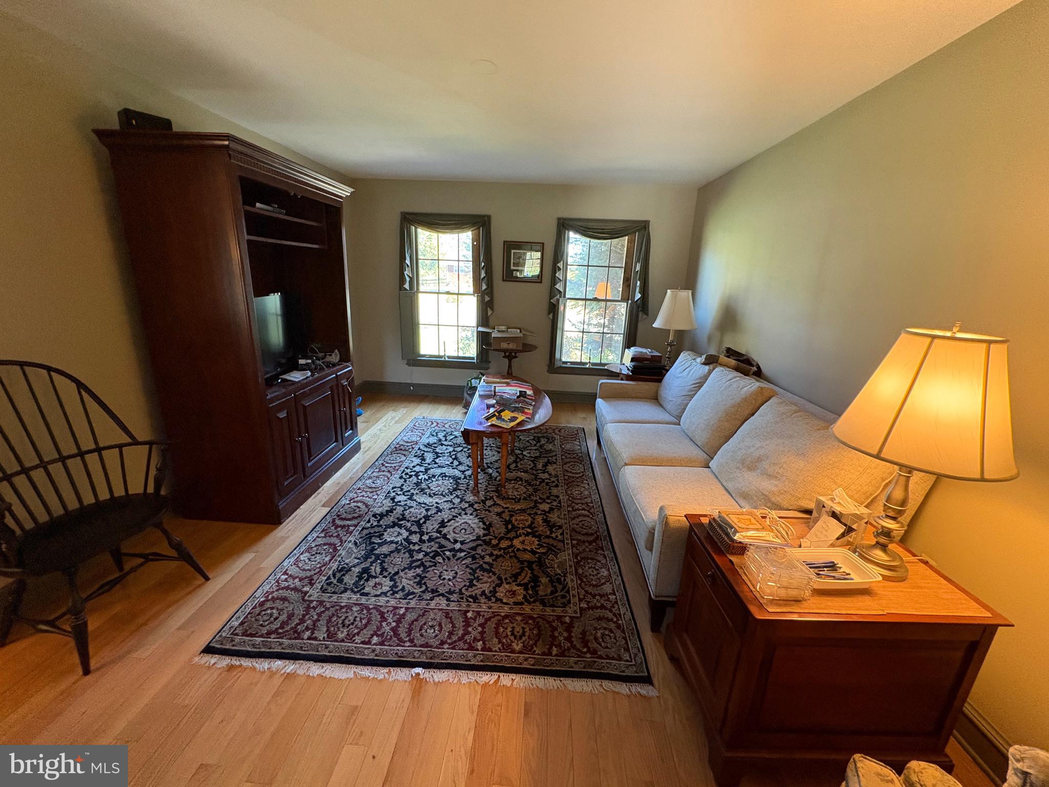 4503 Crosswicks Hamilton Square Road Robbinsville, NJ 08691 - Photo 16 of 44 a living room with furniture rug and window