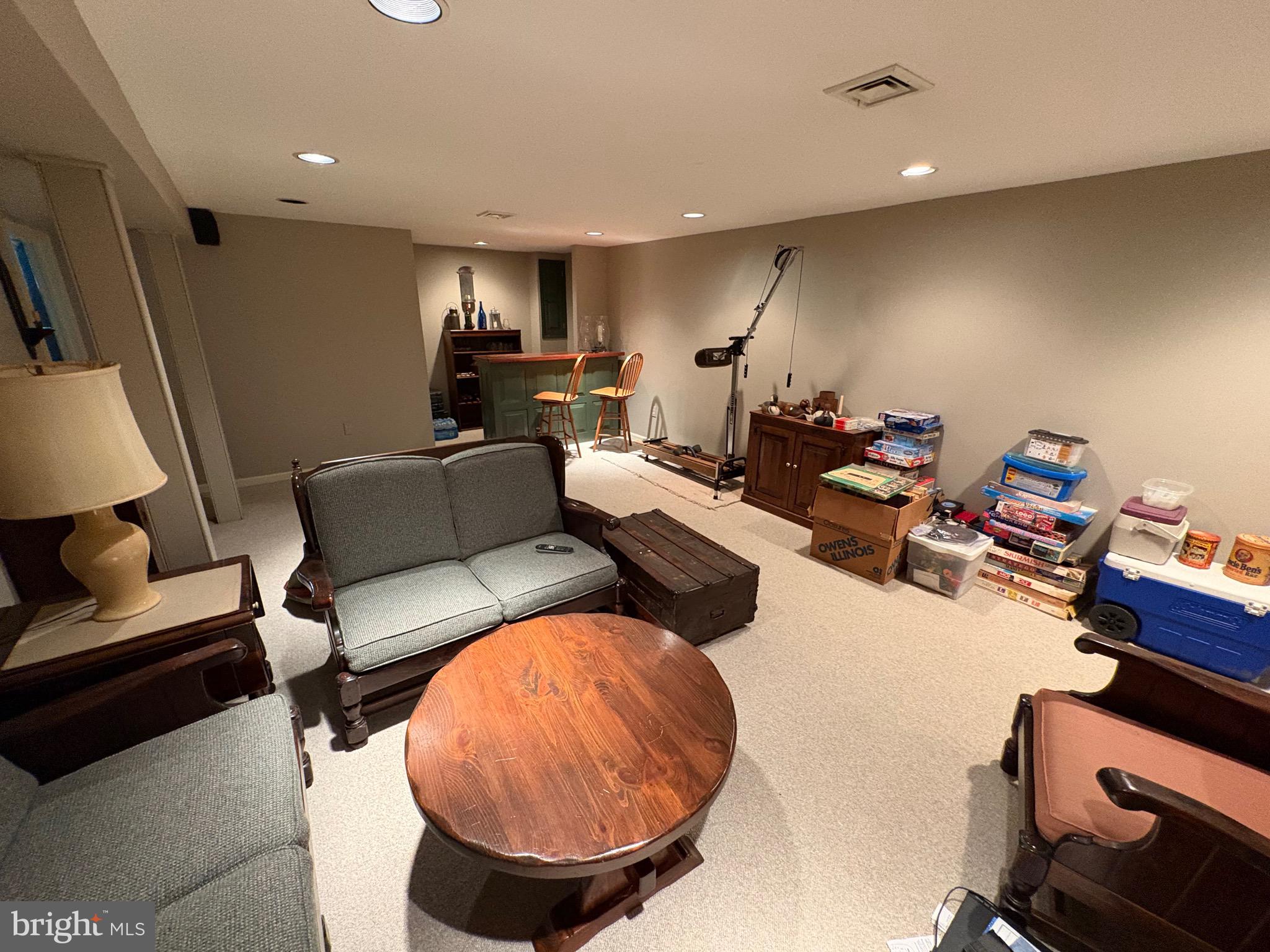 4503 Crosswicks Hamilton Square Road Robbinsville, NJ 08691 - Photo 20 of 44 a living room with furniture and a mirror