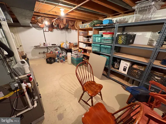 a room with furniture and gym equipment