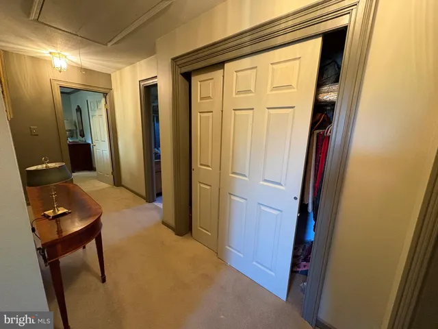 a bedroom with bed and window