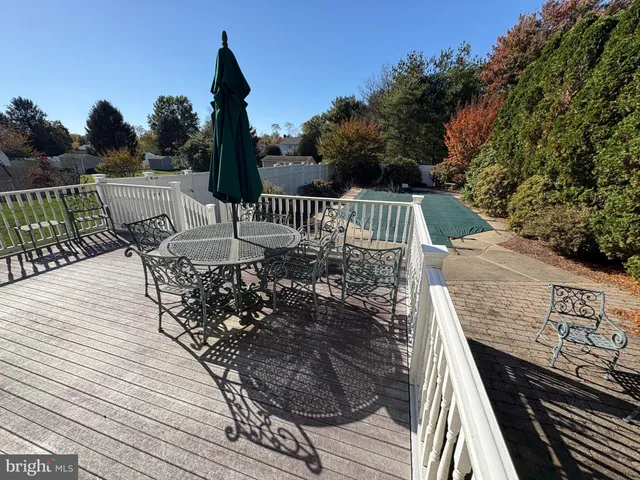 a bedroom with furniture and a book shelf