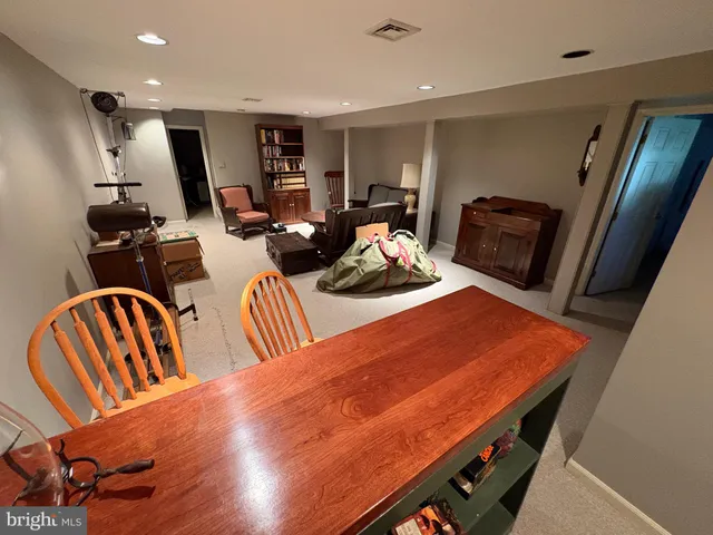a bed room with furniture and wooden floor
