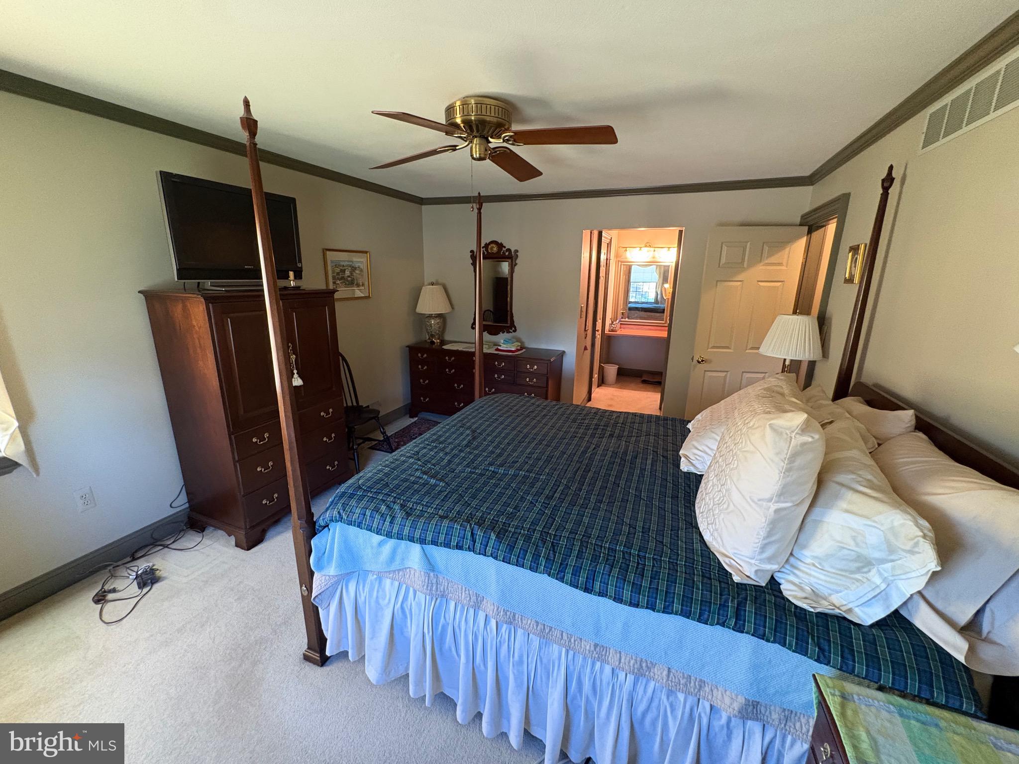 4503 Crosswicks Hamilton Square Road Robbinsville, NJ 08691 - Photo 36 of 44 a bed room with furniture and wooden floor