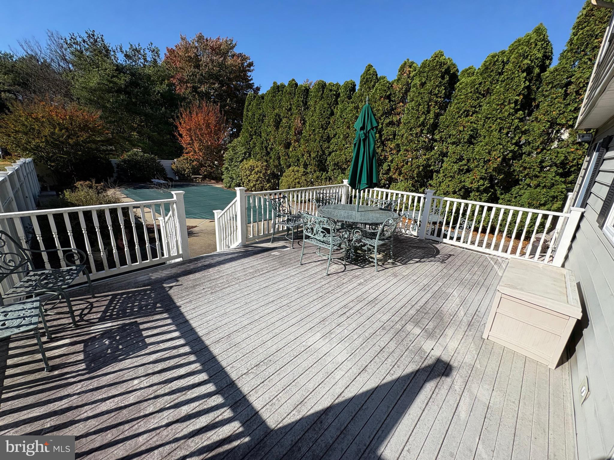 4503 Crosswicks Hamilton Square Road Robbinsville, NJ 08691 - Photo 40 of 44 a view of balcony with wooden floor and outdoor seating