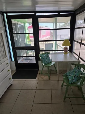 a bathroom with a sink and a window
