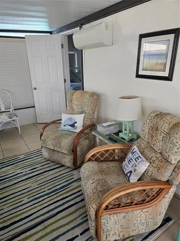 a green field with view of the garden