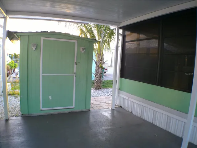 a view of a kitchen and dining room