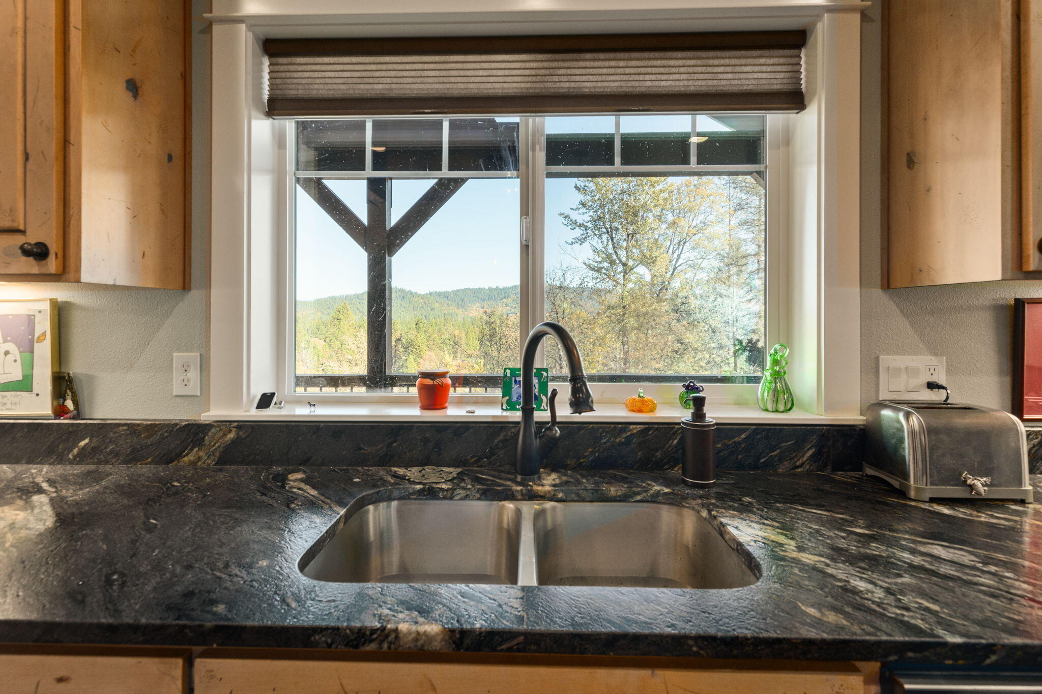 286 Rockinghorse Drive Grants Pass, OR 97527 - Photo 13 of 54 Amazing views out your kitchen window. Whistle while you work. :)