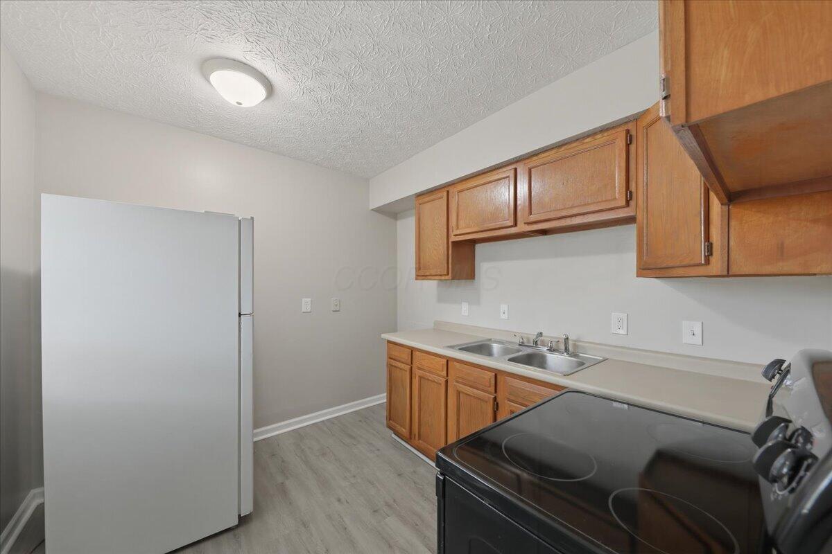 1928 Agler Road Columbus, OH 43224 - Photo 11 of 53 11-Kitchen 2E