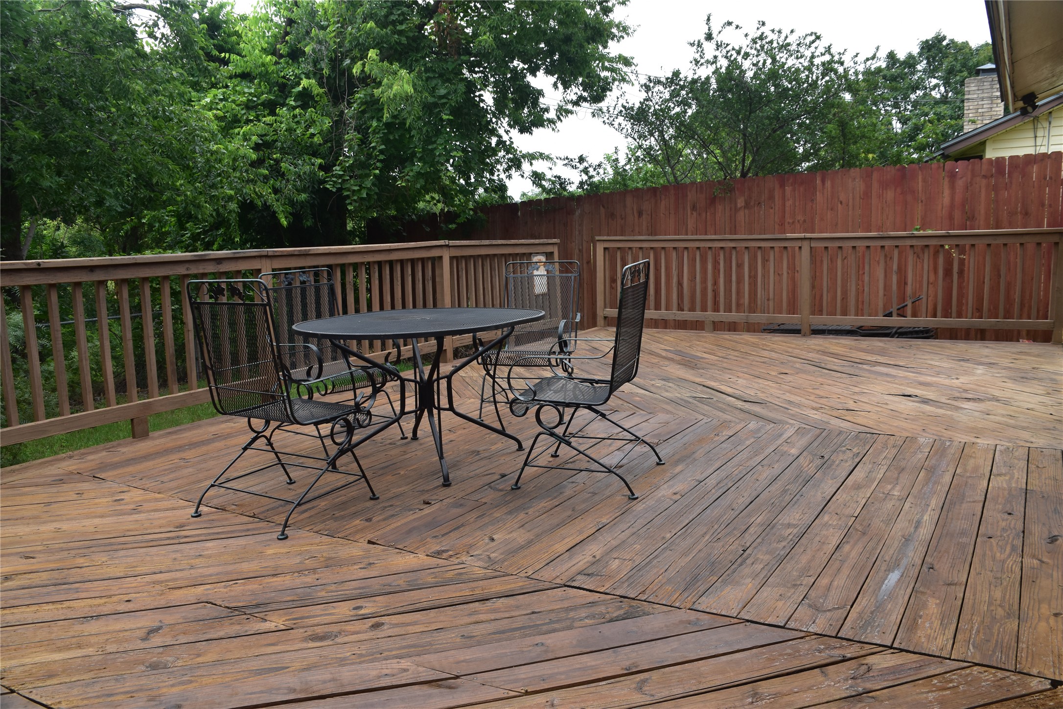 1713 Parkside Circle Round Rock, TX 78664 - Photo 17 of 18 a view of backyard with deck and wooden floor