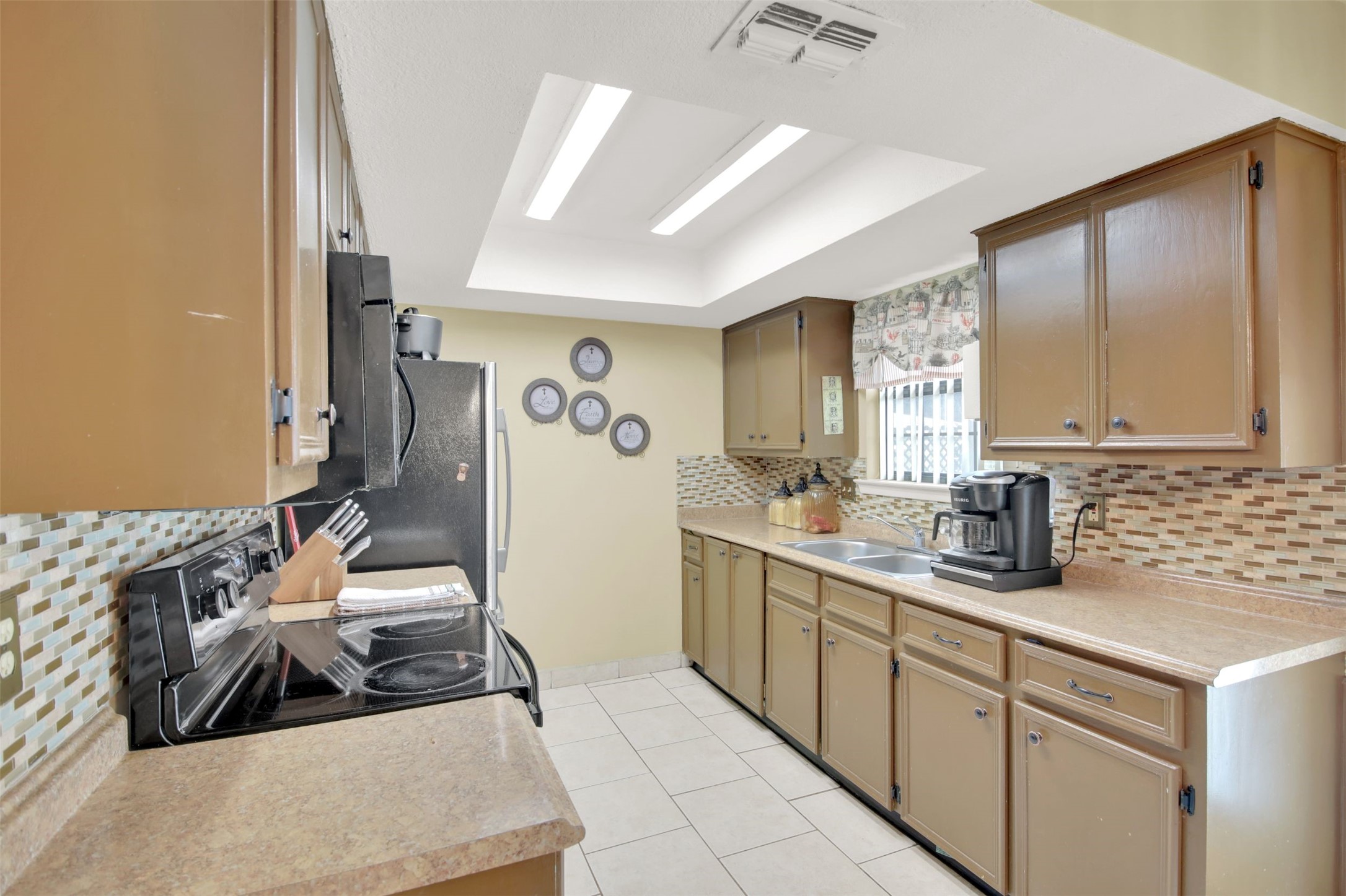 1713 Parkside Circle Round Rock, TX 78664 - Photo 6 of 18 a kitchen with sink and cabinets