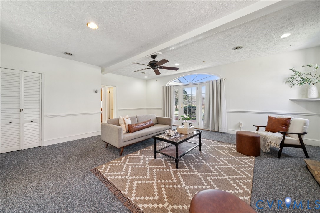 4411 Courthouse Road Prince George, VA 23875 - Photo 14 of 38 a living room with furniture and a large window