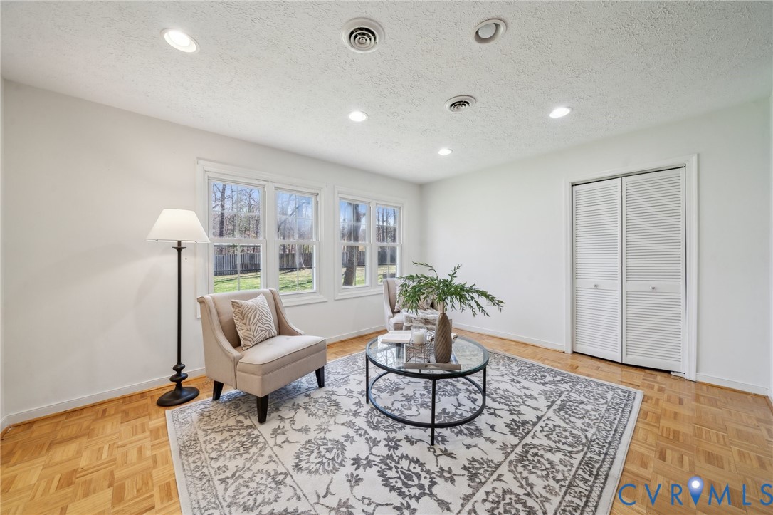 4411 Courthouse Road Prince George, VA 23875 - Photo 23 of 38 a living room with furniture and wooden floor