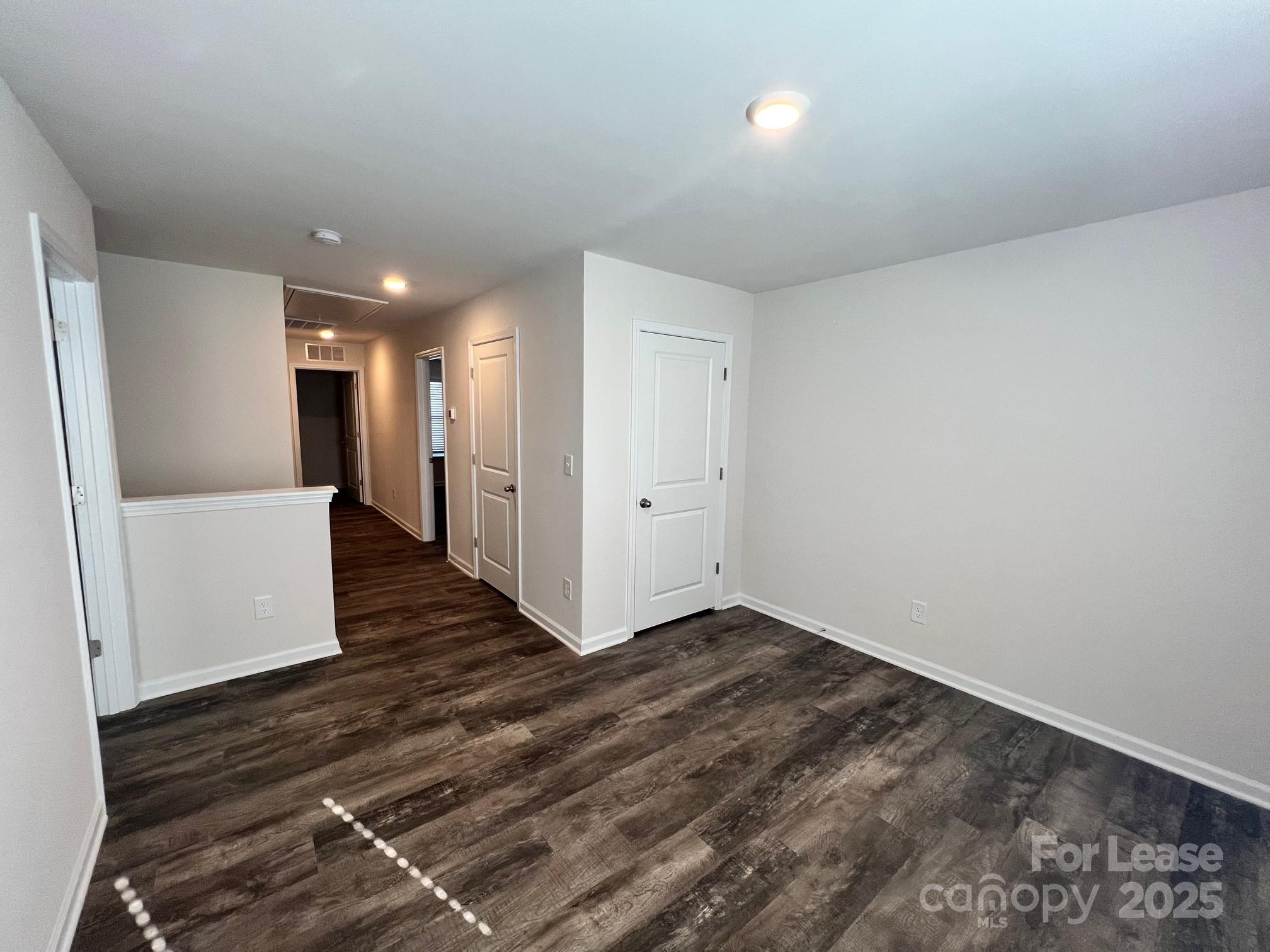 7868 Whispering Stream Drive Sherrills Ford, NC 28673 - Photo 19 of 35 a view of a hallway with wooden floor