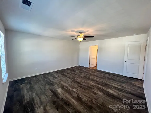 a bathroom with a double vanity sink and mirror
