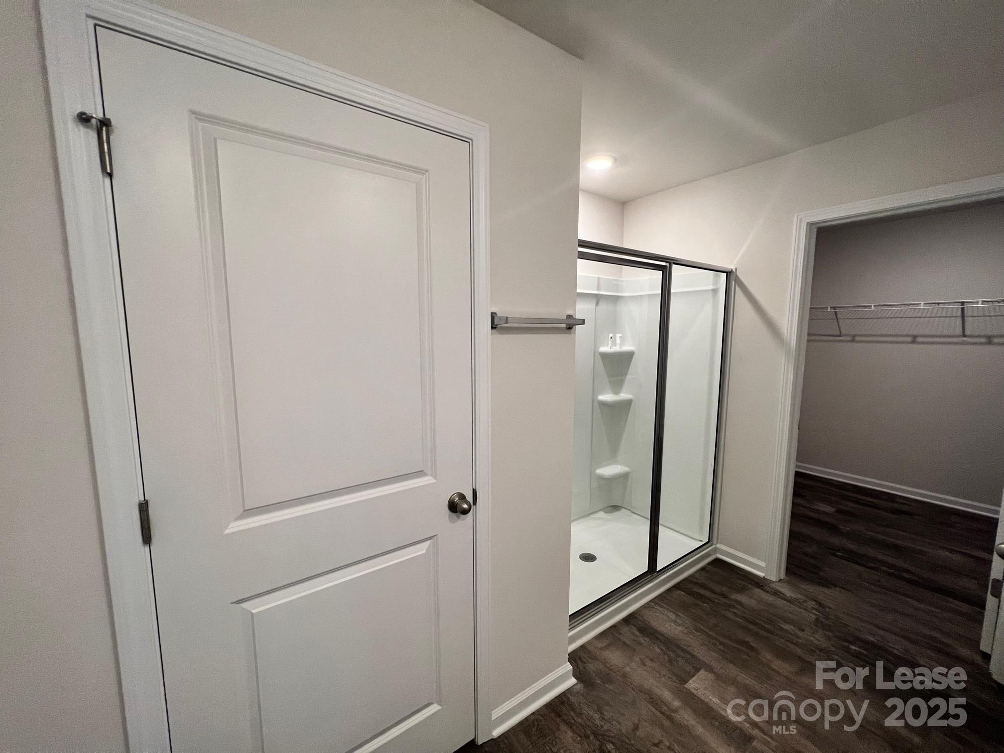 7868 Whispering Stream Drive Sherrills Ford, NC 28673 - Photo 26 of 35 a bathroom with a shower and a glass door