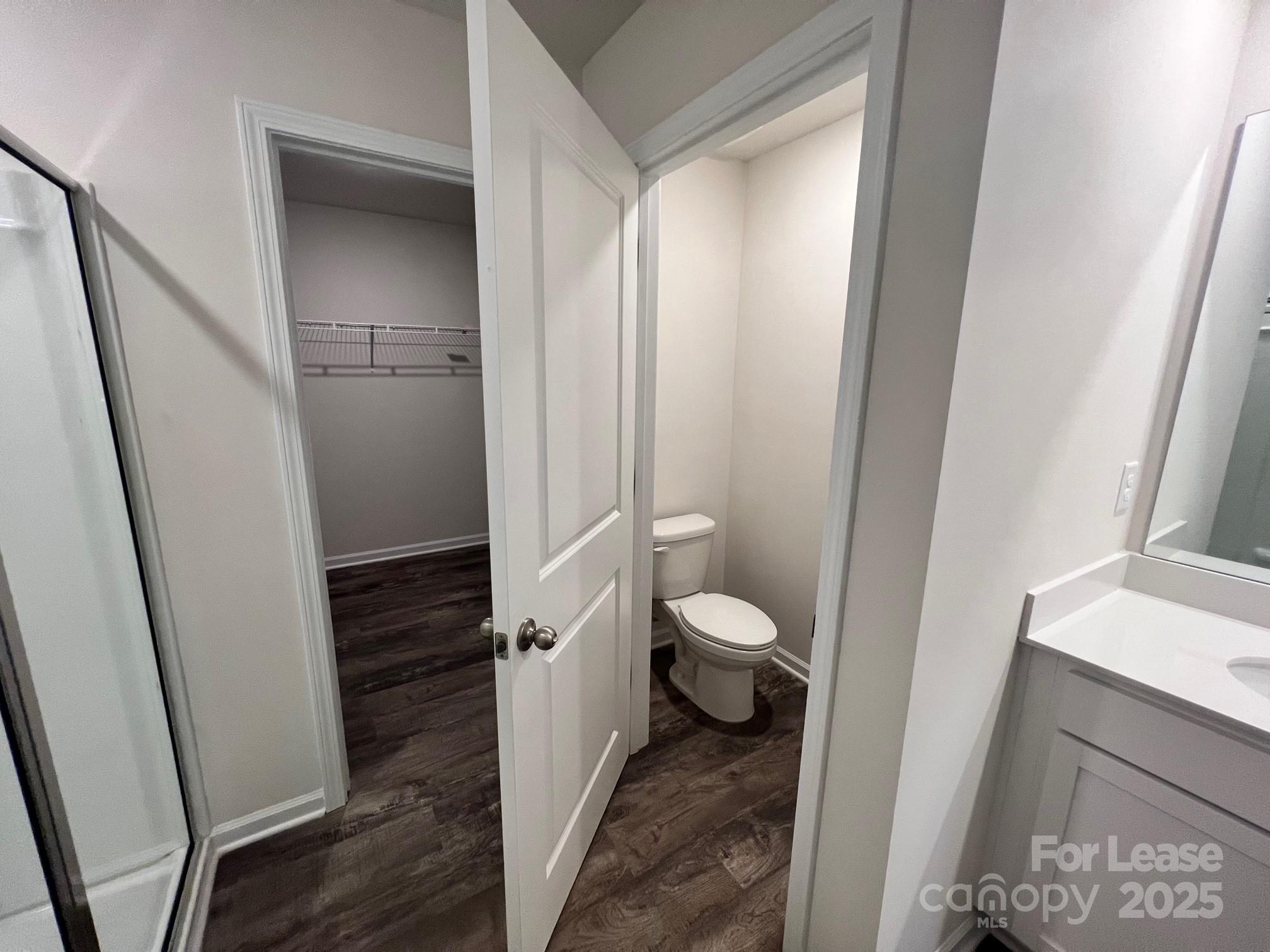 7868 Whispering Stream Drive Sherrills Ford, NC 28673 - Photo 28 of 35 a bathroom with a toilet and a shower