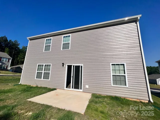 a view of a house with garden