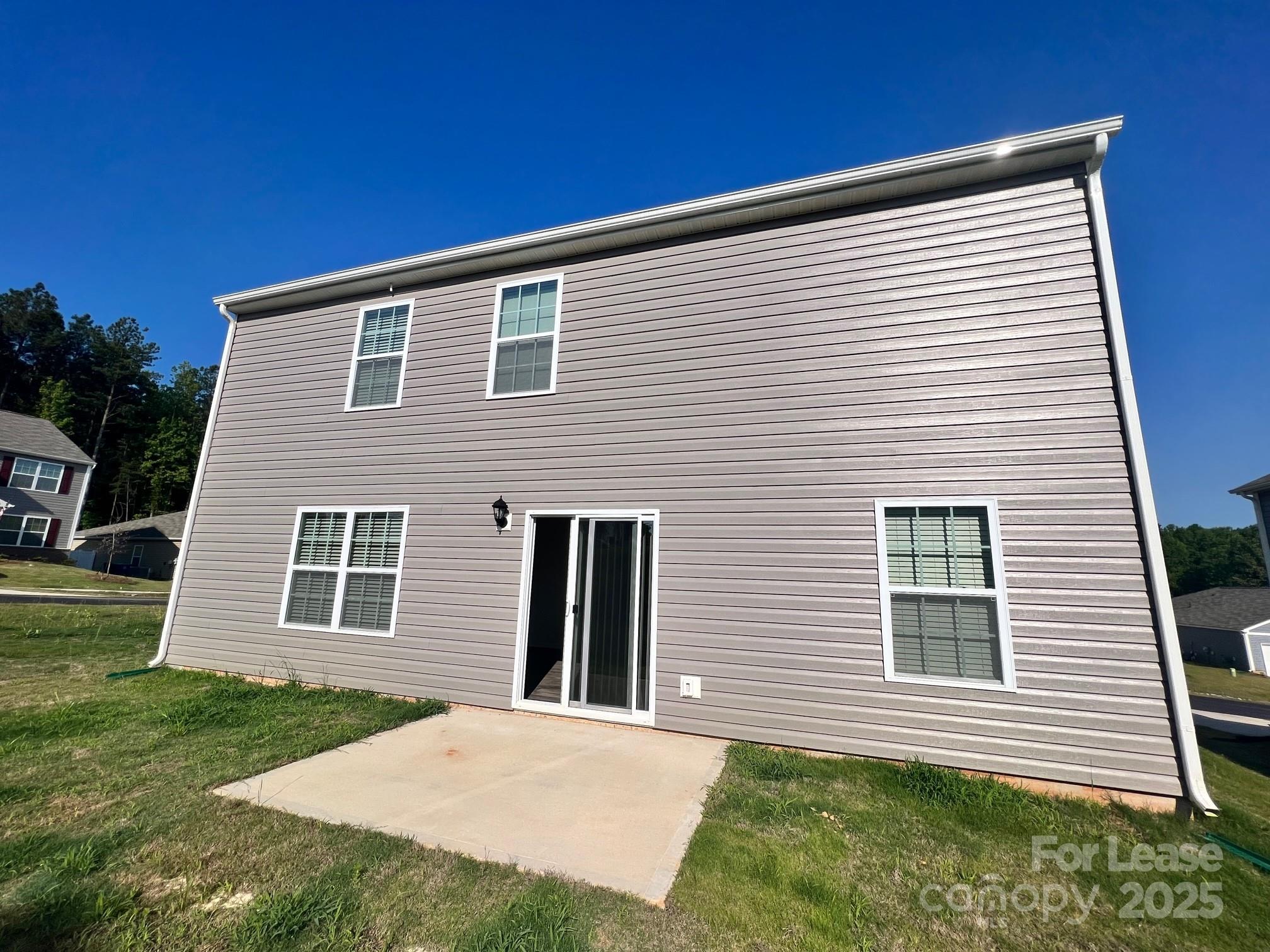 7868 Whispering Stream Drive Sherrills Ford, NC 28673 - Photo 33 of 35 a front view of a house with a yard