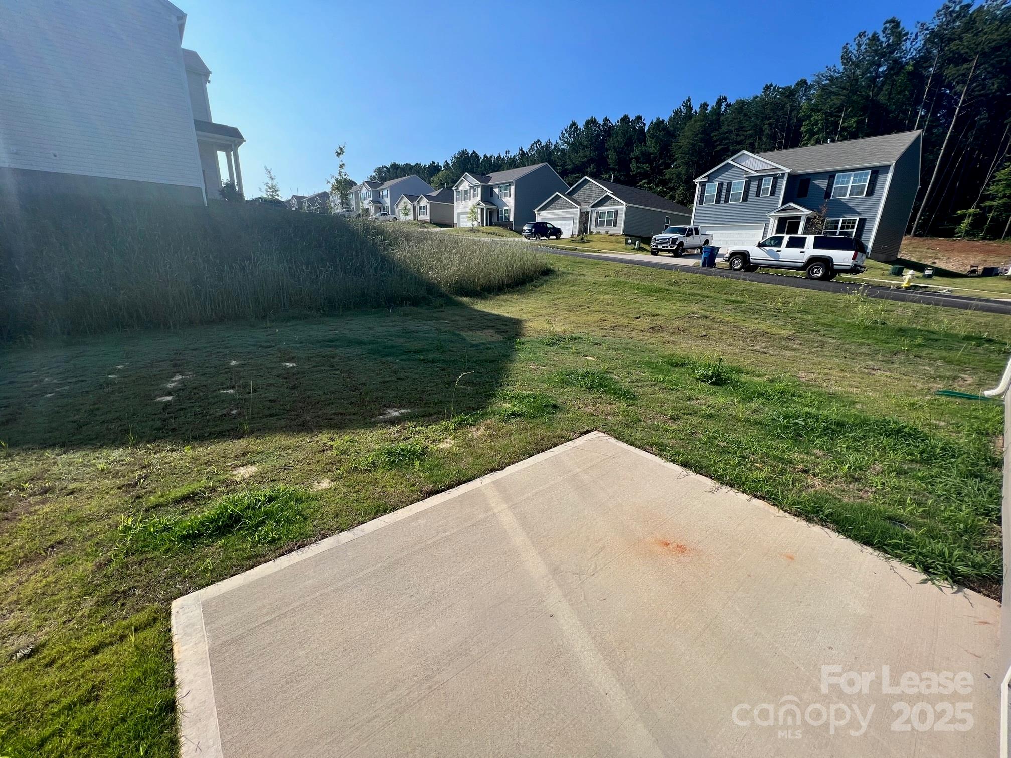 7868 Whispering Stream Drive Sherrills Ford, NC 28673 - Photo 34 of 35 a view of a house with garden