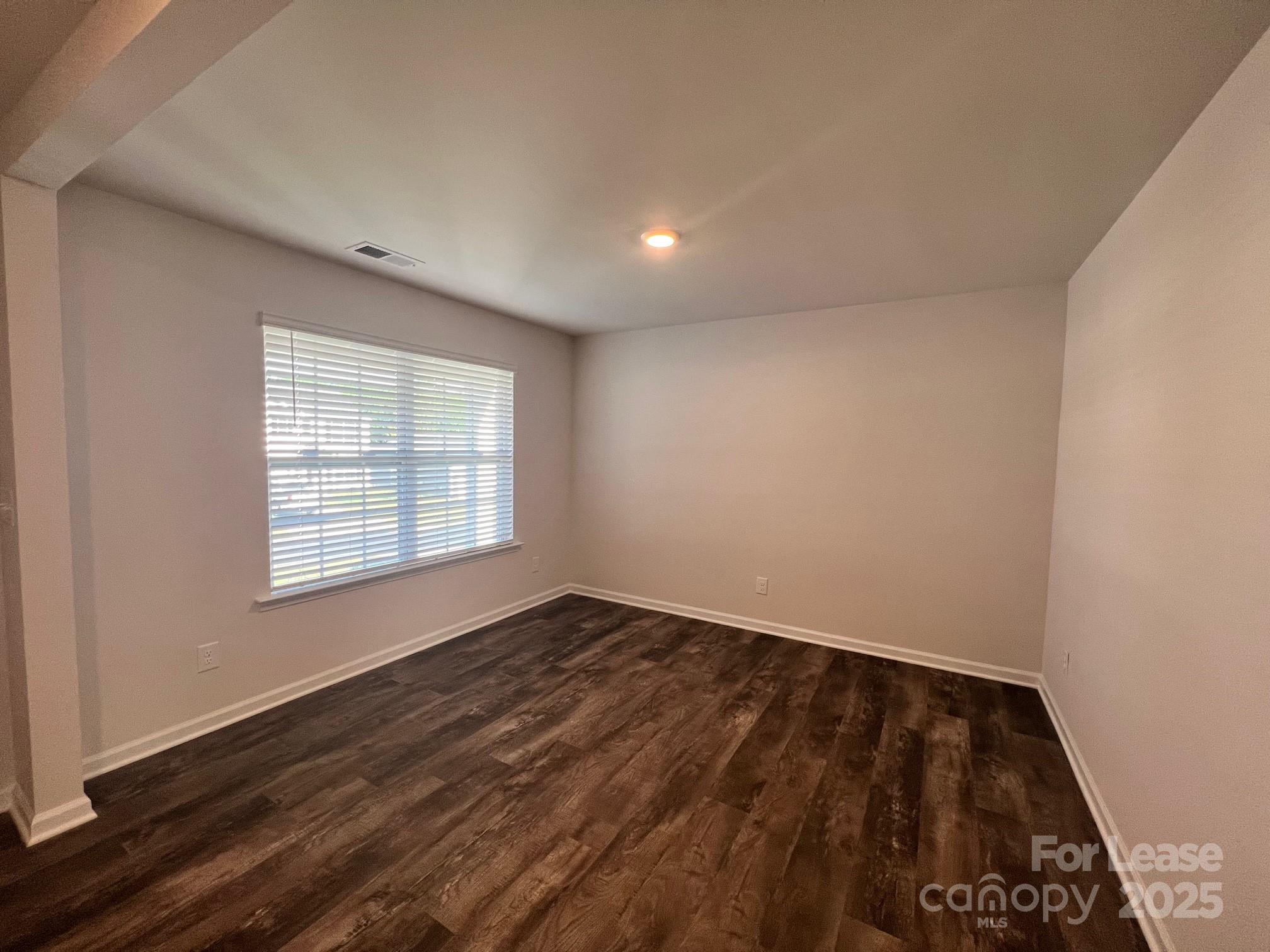 7868 Whispering Stream Drive Sherrills Ford, NC 28673 - Photo 5 of 35 a view of an empty room and a window