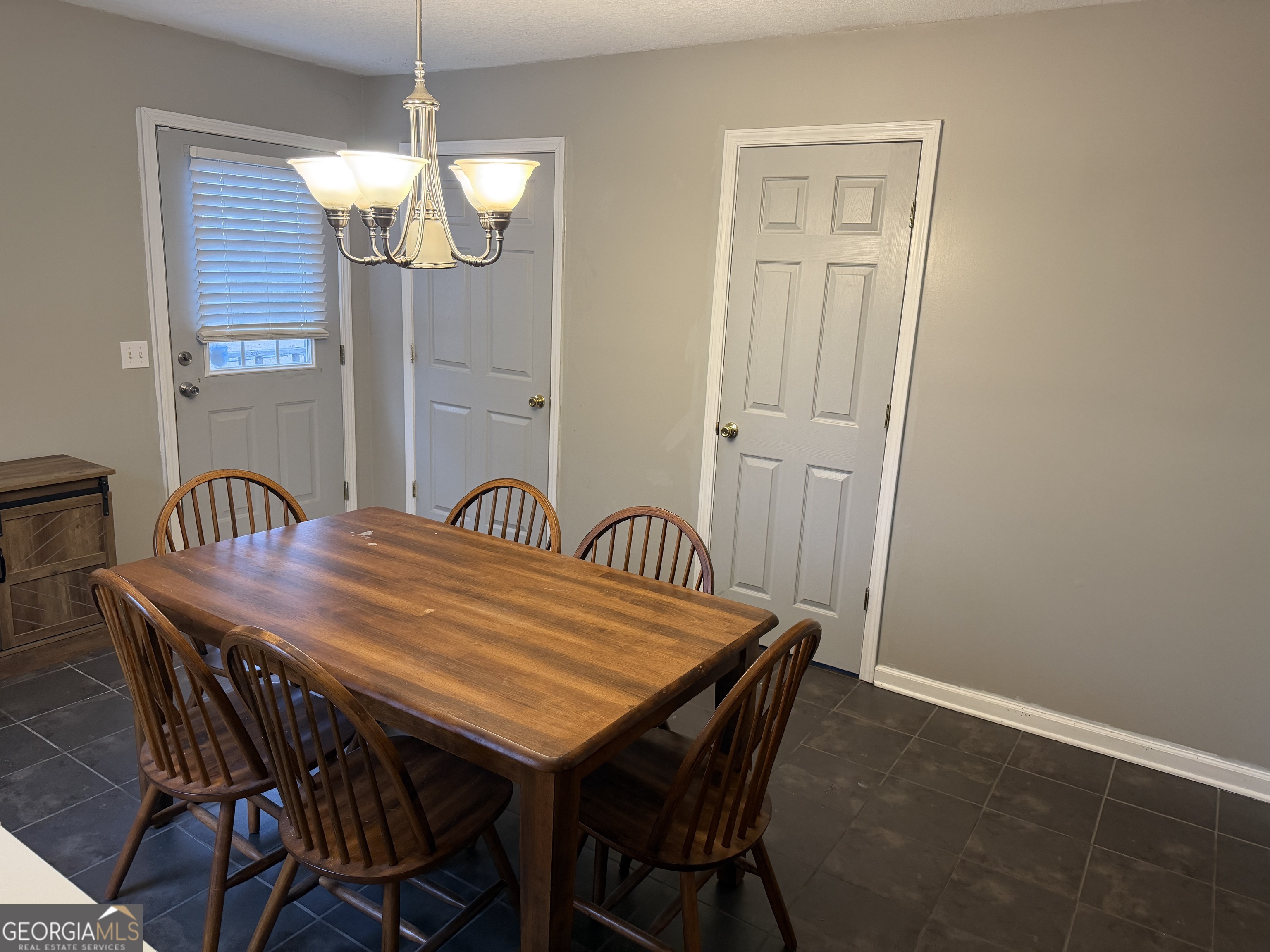 141 Evergreen Church Road Cobbtown, GA 30420 - Photo 16 of 29 a view of a dining room with furniture