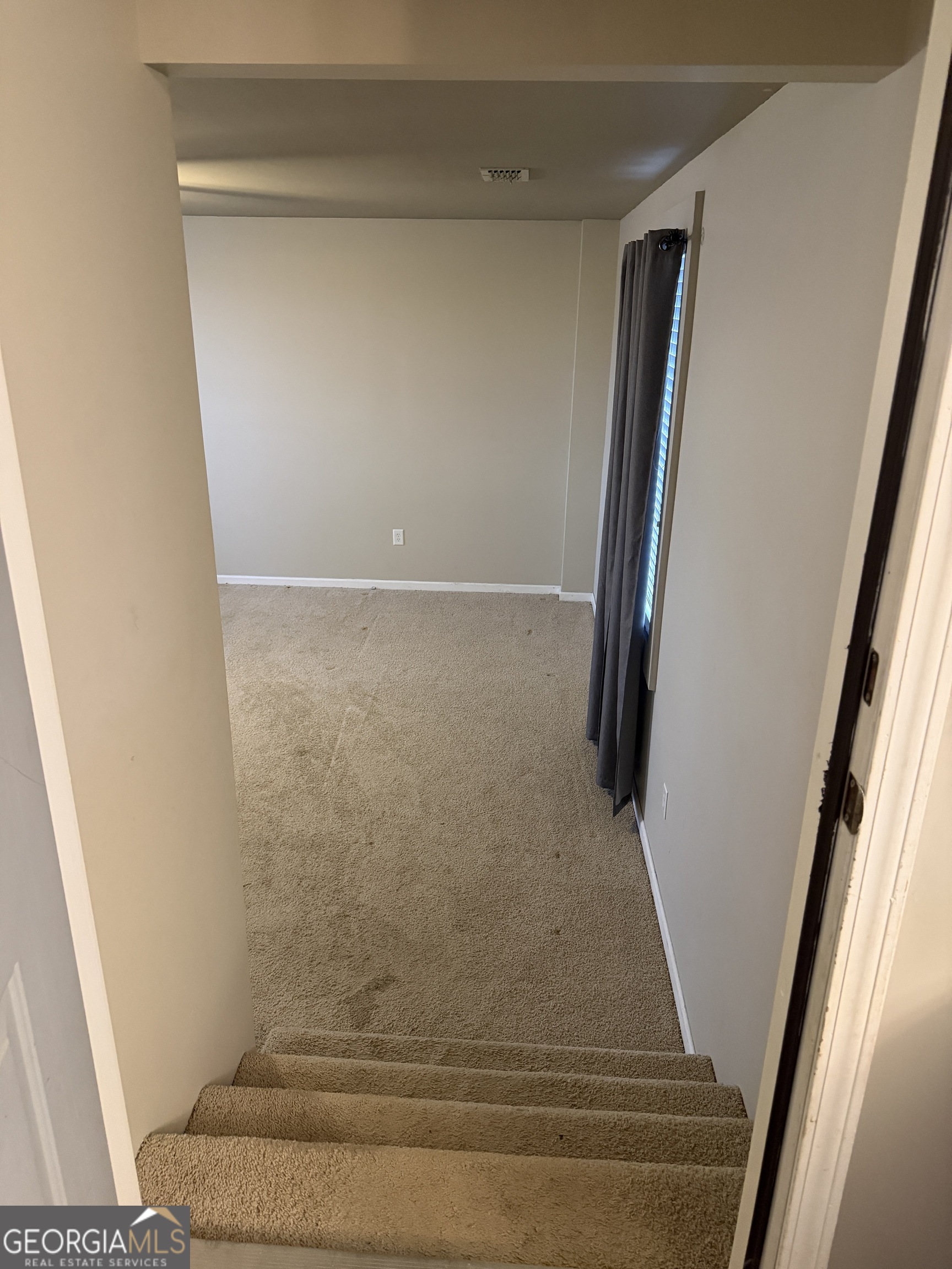 141 Evergreen Church Road Cobbtown, GA 30420 - Photo 19 of 29 a view of staircase with rug