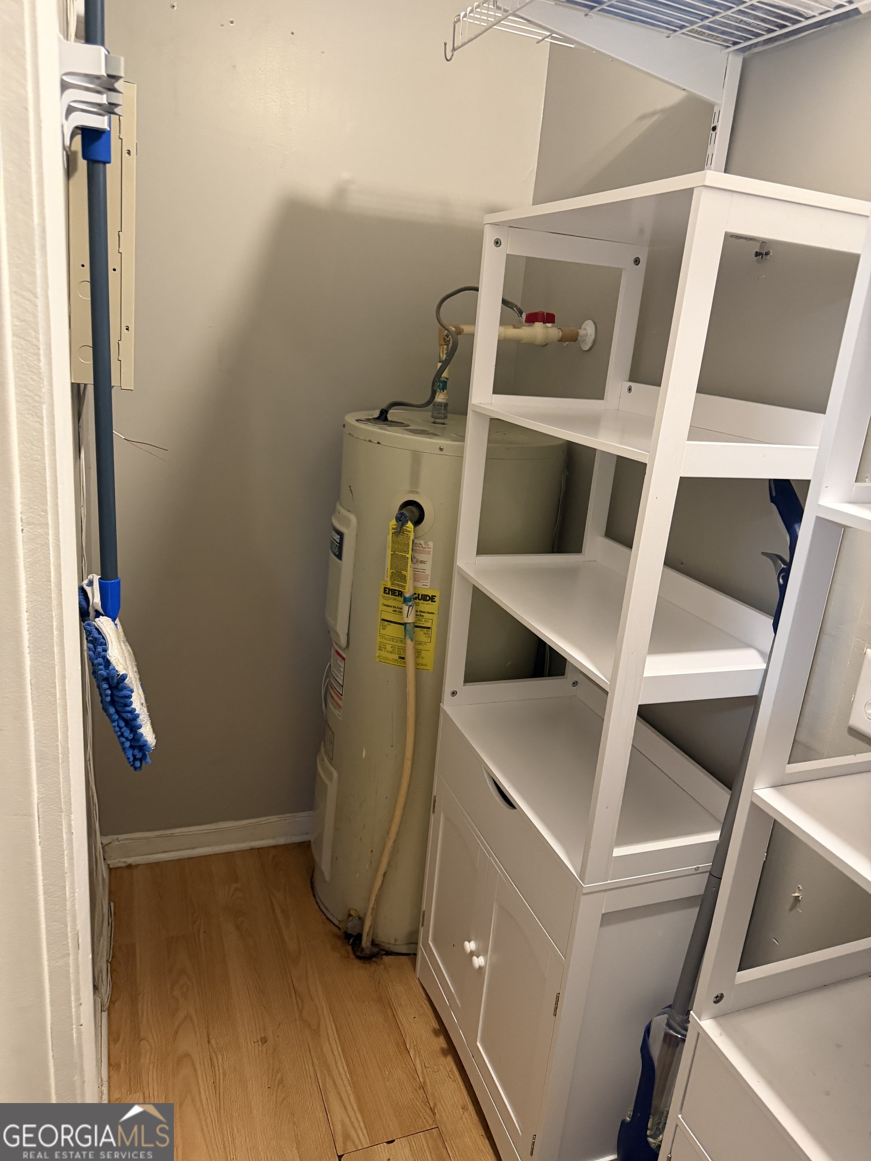 141 Evergreen Church Road Cobbtown, GA 30420 - Photo 24 of 29 a view of walk in closet with empty racks