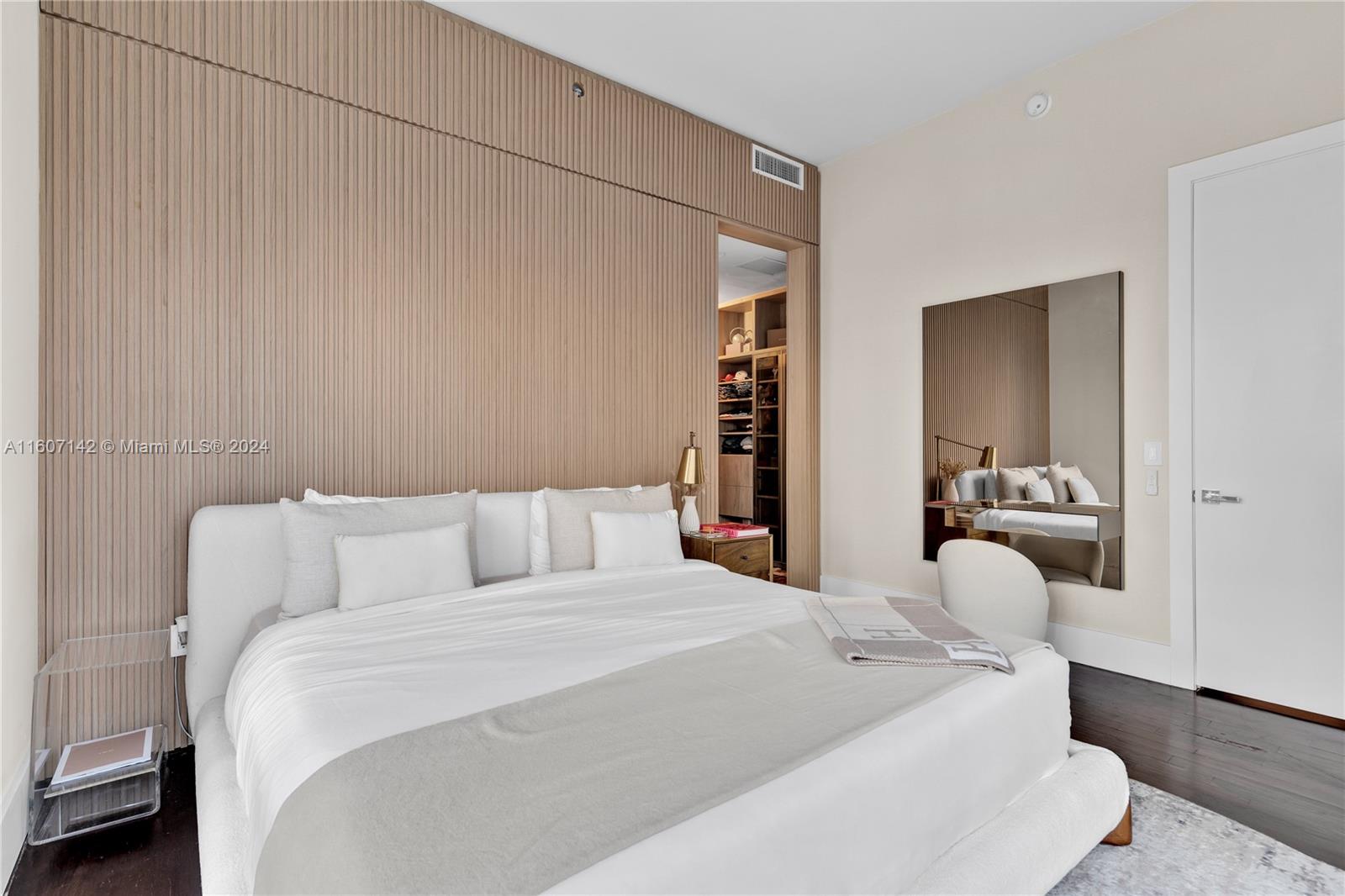 951 Brickell Avenue, Unit PH4111 Miami, FL 33131 - Photo 13 of 32 a large white bed in a white room