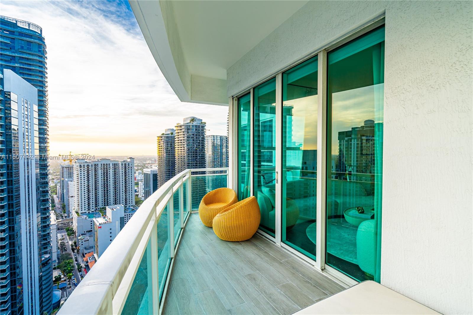 951 Brickell Avenue, Unit PH4111 Miami, FL 33131 - Photo 29 of 32 a view of balcony with a sink and glass door