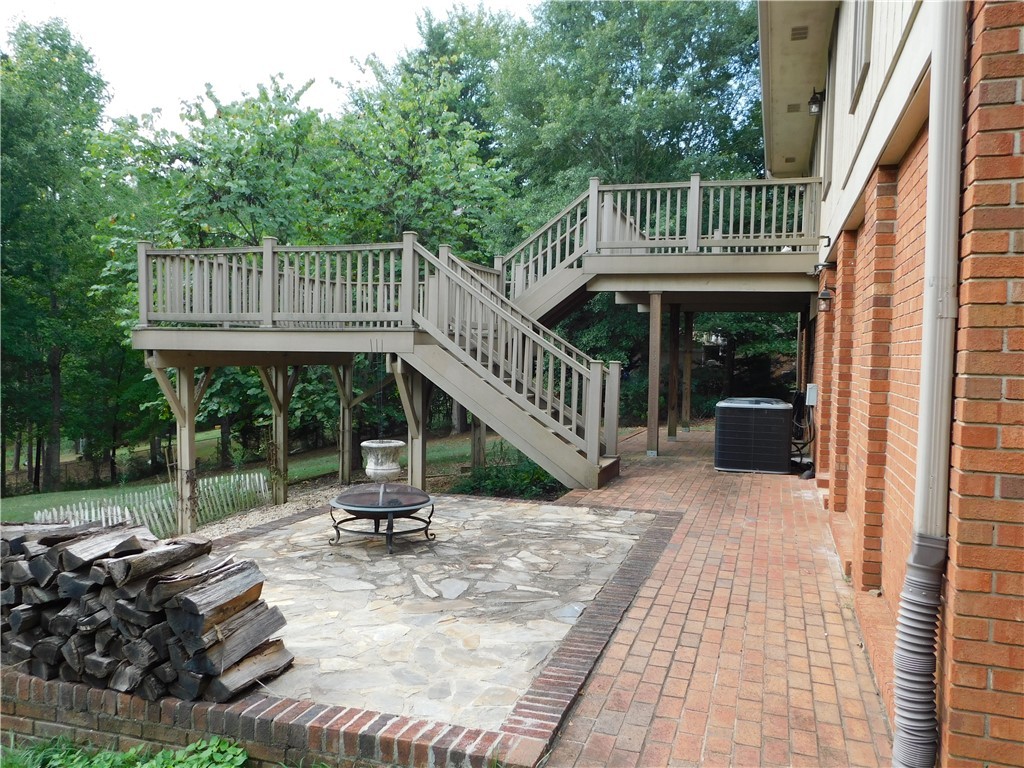 1132 Moorehead Place Pendleton, SC 29670 - Photo 4 of 37 Great entertaining patio with multi level deck on