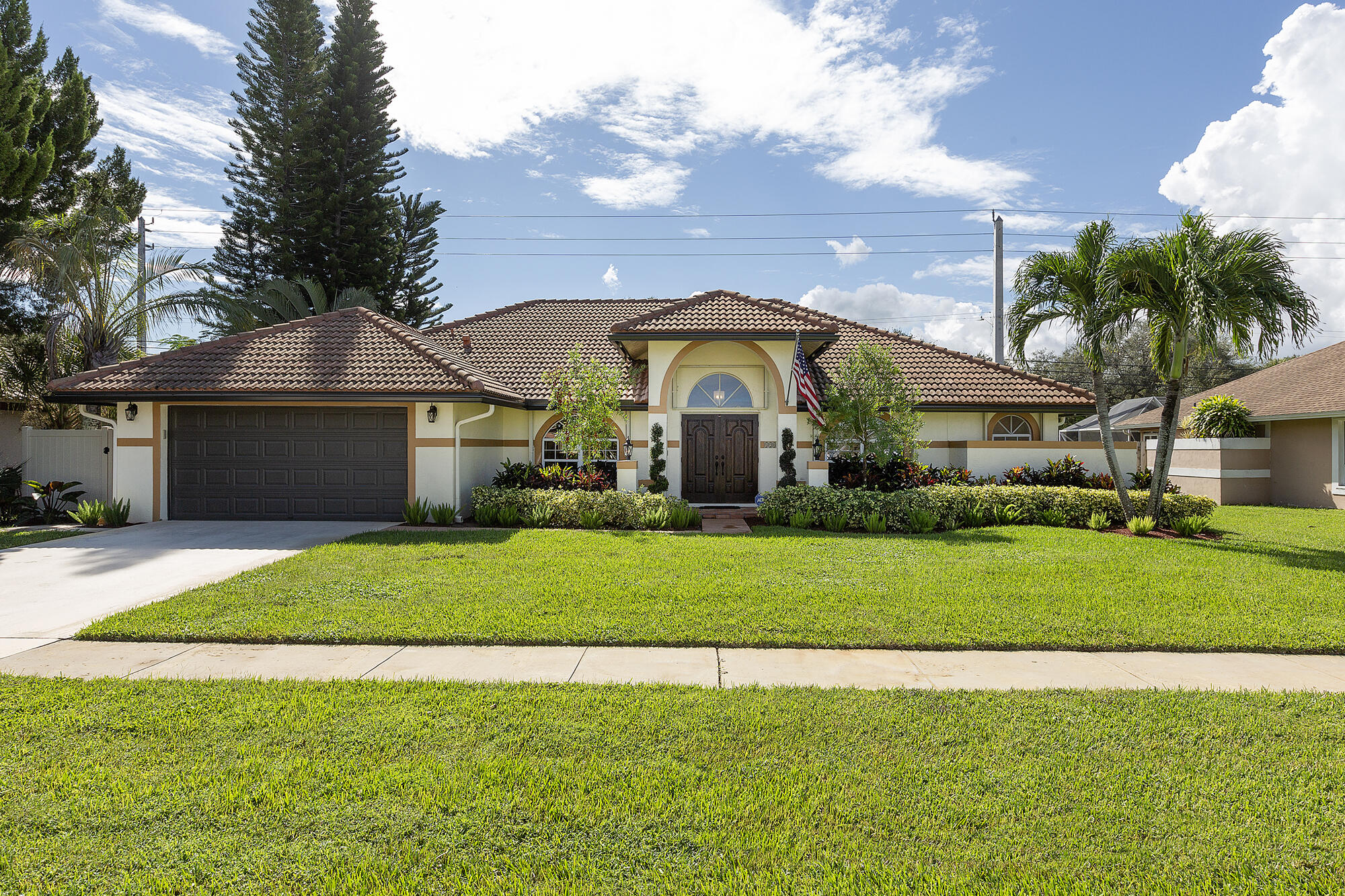 12898 Buckland Street Wellington, FL 33414 - Photo 1 of 35 01_FrontExterior_1