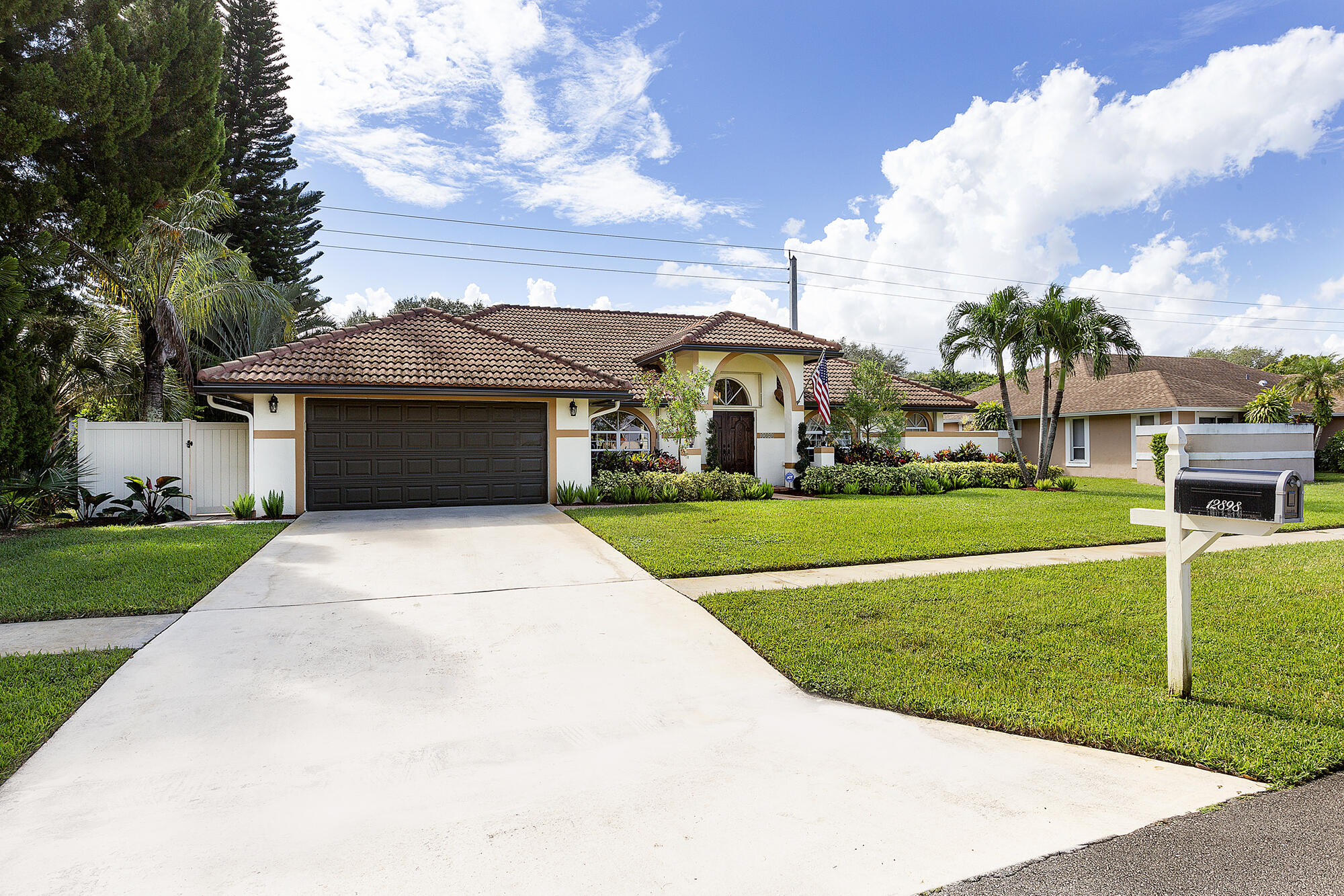 12898 Buckland Street Wellington, FL 33414 - Photo 2 of 35 02_FrontExterior_2