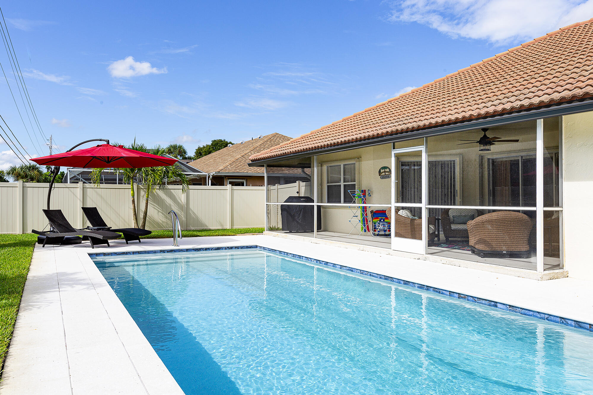 12898 Buckland Street Wellington, FL 33414 - Photo 32 of 35 33_Pool_Patio1 (1)