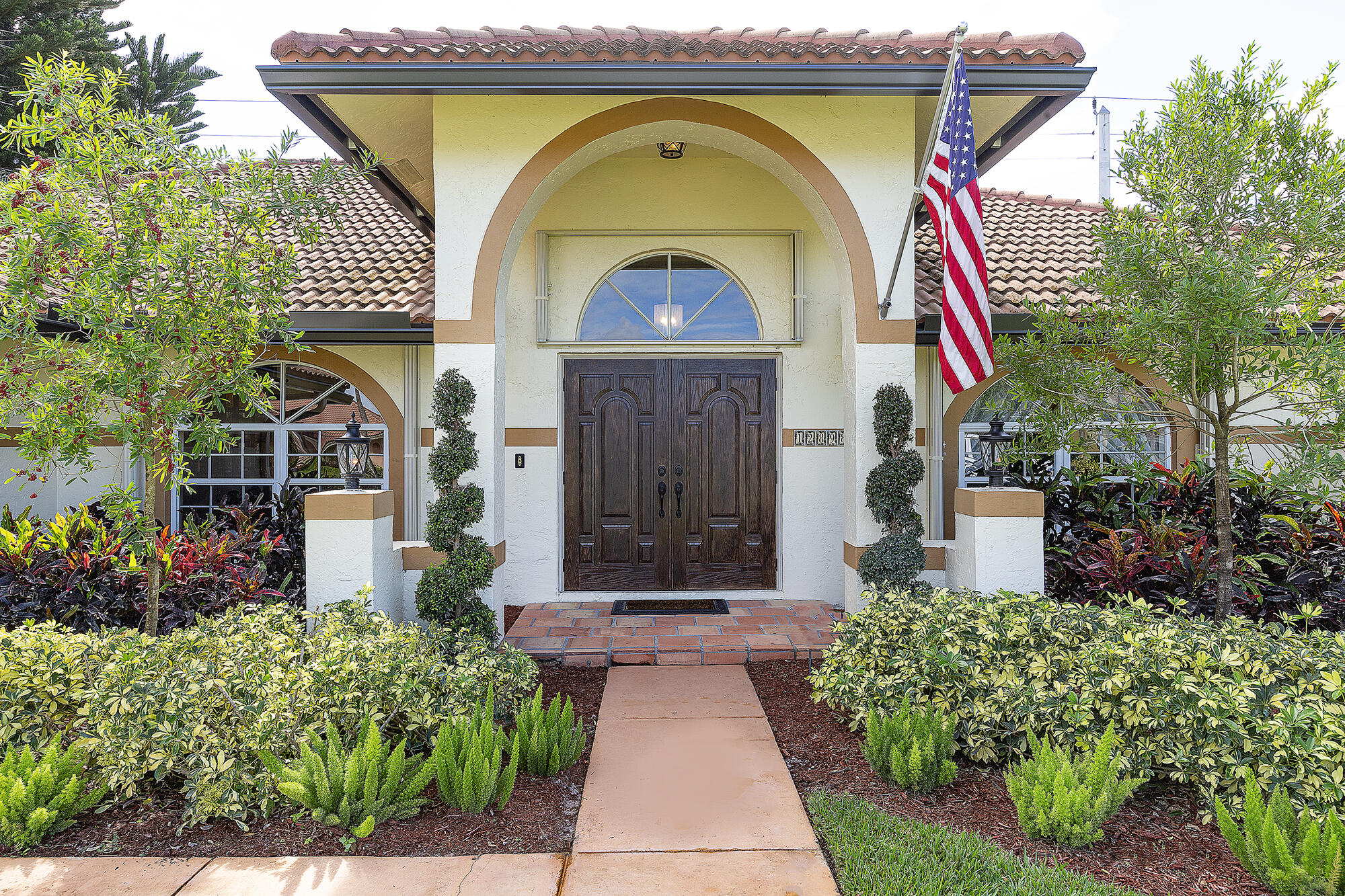 12898 Buckland Street Wellington, FL 33414 - Photo 5 of 35 05_FrontDoor_Exterior