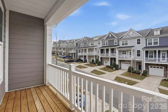 a view of a brick building from a balcony