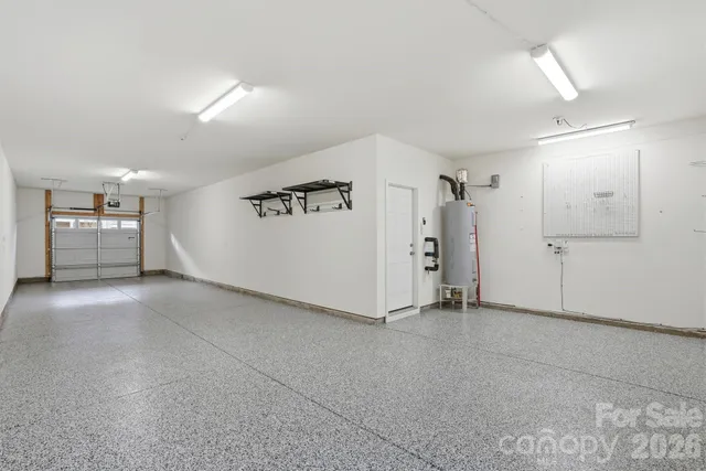 a view of a big room with closet and windows