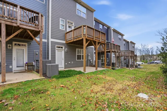 a view of balcony with wooden floor