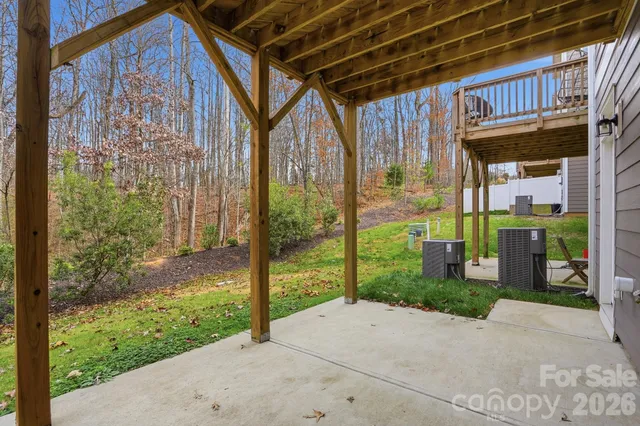 a view of balcony with wooden floor