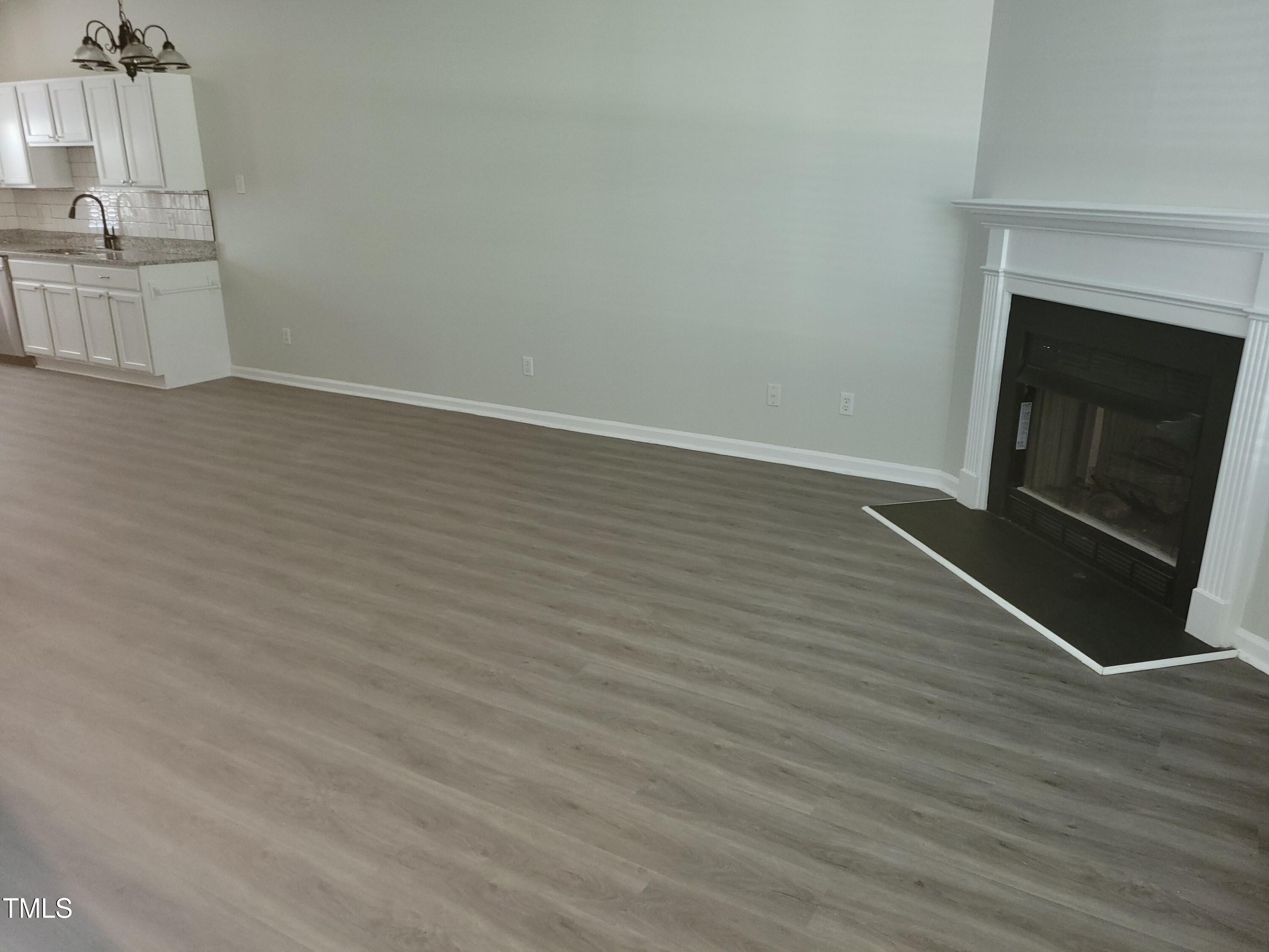 4416 Pottery Lane Raleigh, NC 27616 - Photo 10 of 14 Gas log living room