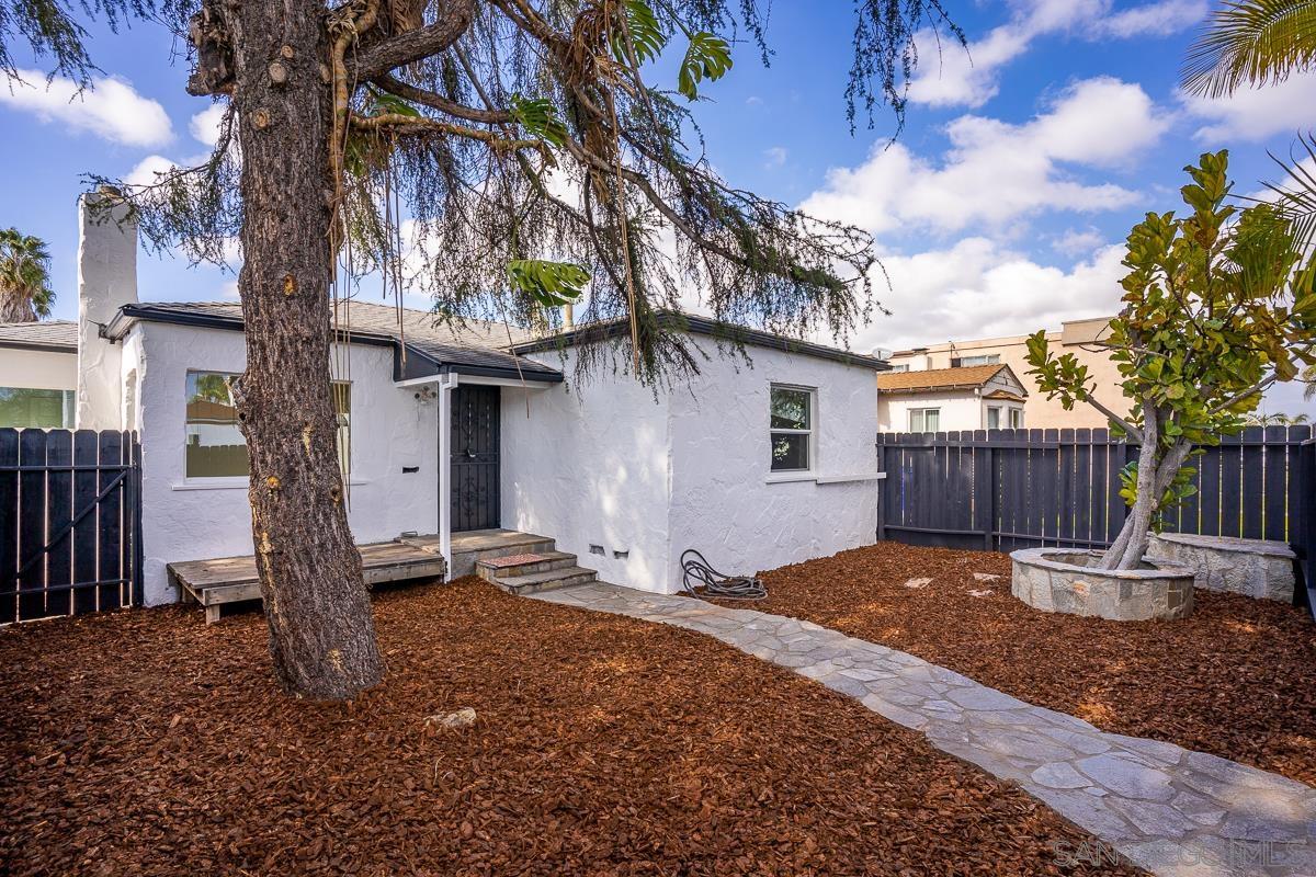 4526-30 52nd Street San Diego, CA 92115 - Photo 1 of 31 a backyard of a house with lots of green space