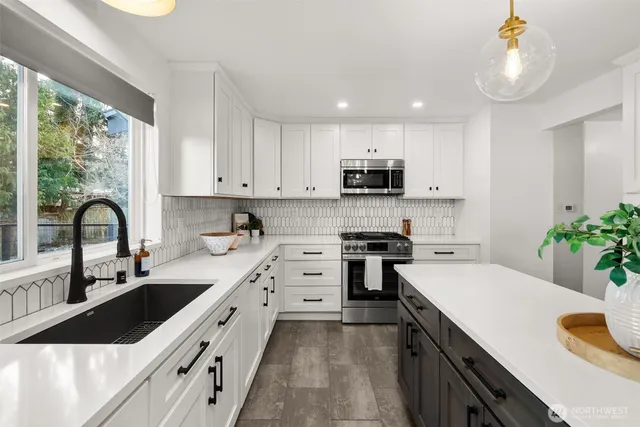 a dining room with furniture and a chandelier