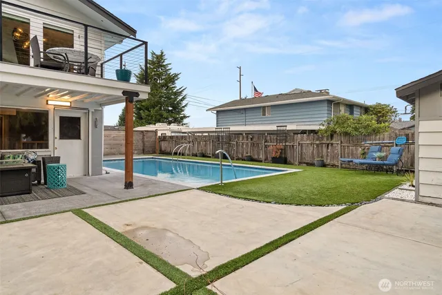 a view of outdoor space yard deck and swimming pool