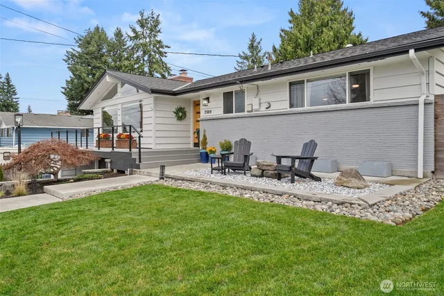 a balcony with tall trees