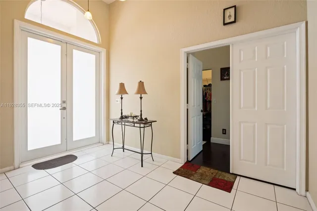 a view of kitchen with furniture and window