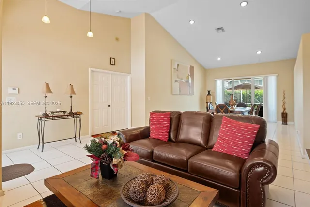 a living room with furniture and a couch