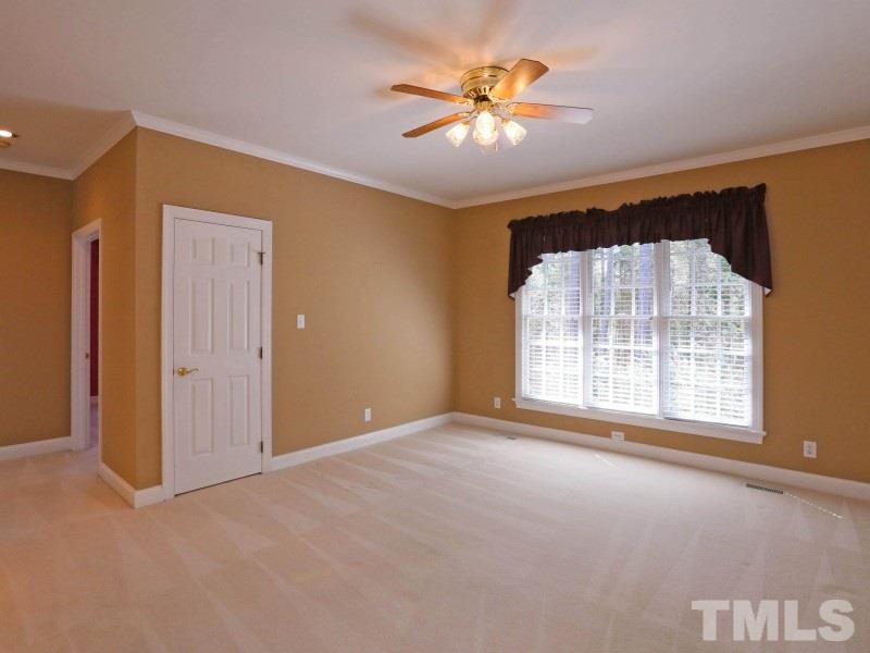 2827 Pleasant Green Road Durham, NC 27705 - Photo 16 of 25 large family room between Master suite and guest rooms
